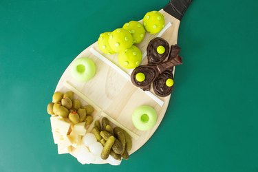 Pickleball paddle with charcuterie ingredients