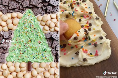 A tree made out of frosting surrounded by vanilla wafers and chocolate cookies next to a vanilla wafer being dipped in vanilla frosting.