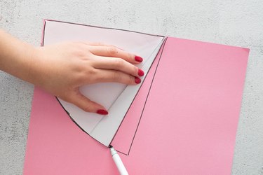 Trace cone template on light pink card stock paper