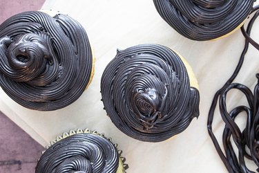 Vanilla cupcakes with black icing