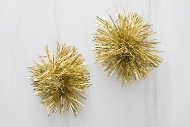 Gold tinsel pom poms for earrings
