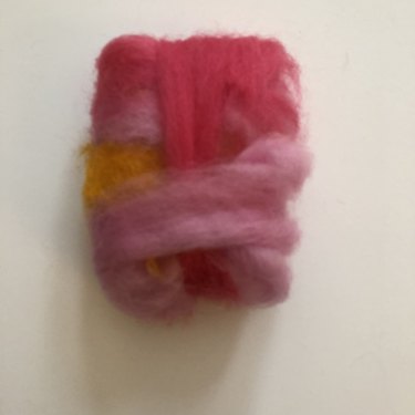 Bar of soap wrapped in wool roving