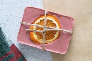 Mulled wine-scented Christmas soap with twine tied around it