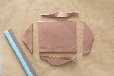 Cut brown clay into rectangle
