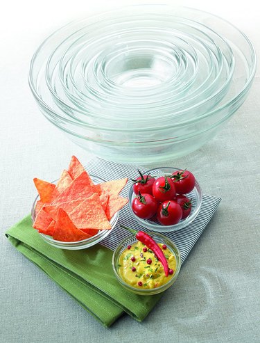 Nested set of Duralex mixing bowls on a counter, with snacks