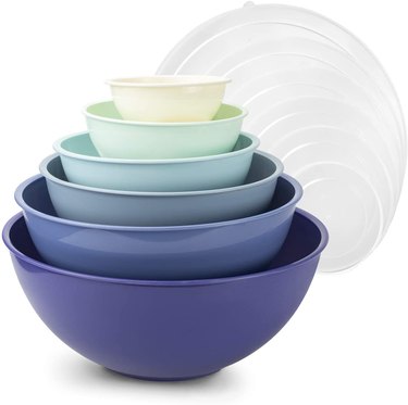 Nested set of blue mixing bowls on a white ground