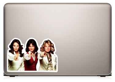 "Charlie's Angels" sticker on a silver laptop
