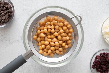 Chickpeas in a mesh strainer