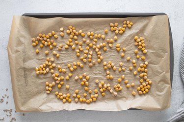 Roasted chickpeas on a baking sheet