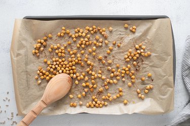 Roasted chickpeas on a baking sheet