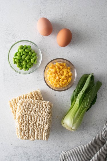 Ingredients for soft-boiled egg instant ramen noodle meal