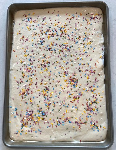 Pancake batter with sprinkles in sheet pan