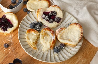 Blueberry and cream cheese danishes on a fluted plate