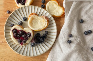Blueberry and plain cheese danishes on a plate