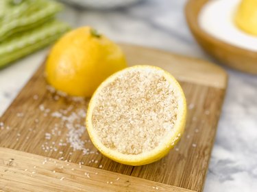lemon and salt cleaning cutting board
