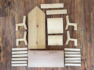 cut out wood pieces for squirrel feeder