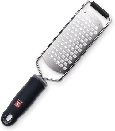 A DI ORO Handheld Cheese Grater