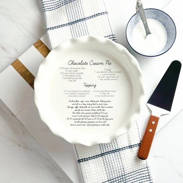 White ceramic pie plate with engraved recipe