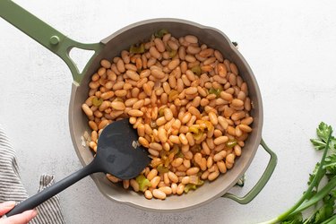 Buffalo-style beans in a large pan