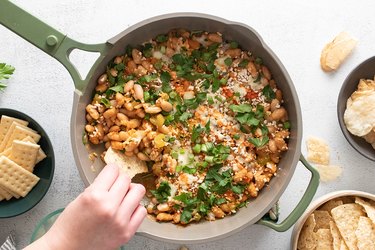 Buffalo-style beans topped with parsley and scallions