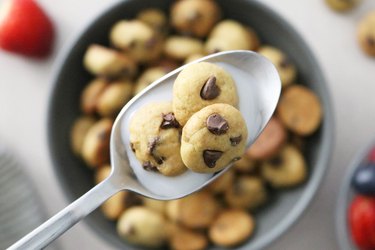 Chocolate chip cookie cereal on a spoon
