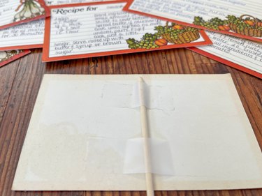 attach wooden skewers to the back of recipe cards