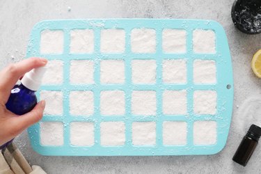 Spray the top of the dishwasher tablets with vinegar