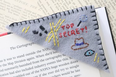 Mystery-themed embroidered corner bookmark
