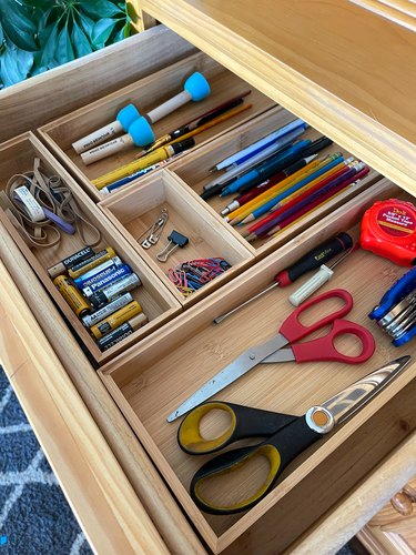 use wooden boxes to organize junk drawers