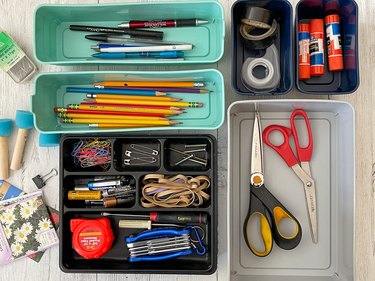 items in plastic bins