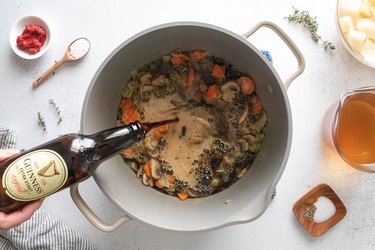 Guinness beer and vegetables in a pot