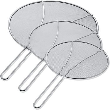 A set of three U.S. Kitchen Supply Stainless Steel Fine Mesh Splatter Screens