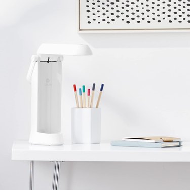 OttLite Folding Lamp on a Desk