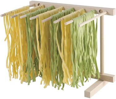 An Eppicotispai Beechwood Collapsible Pasta Drying Rack