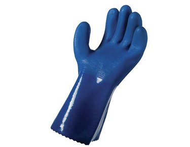 Thick, dark blue rubber glove against a white background.