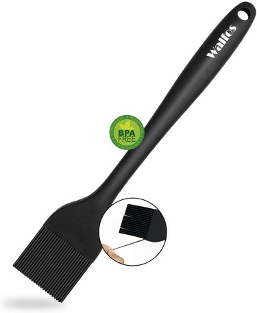 Black silicone pastry brush on a white background with a BPA-free symbol