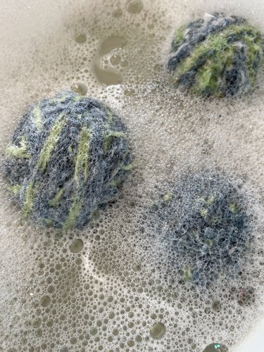 rinse wool balls in hot water