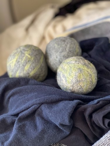 felted wool dryer balls in the dryer