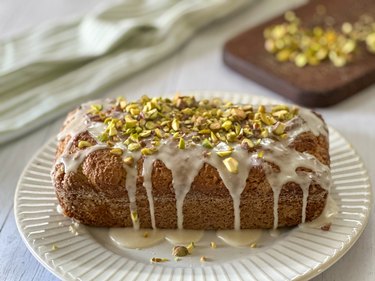 pistachio bread with glaze and chopped pistachios on top