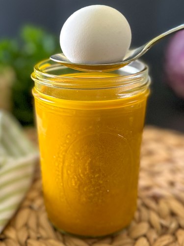 Add hard-boiled egg to turmeric dye