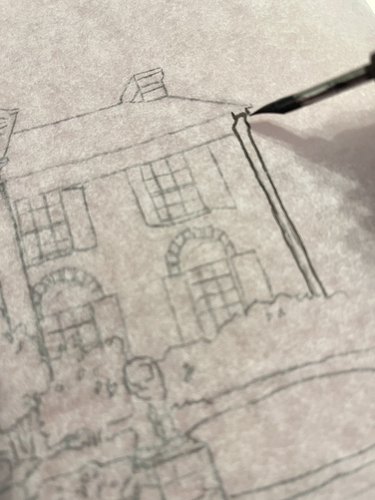 Pen and ink tracing lines of traced house drawing