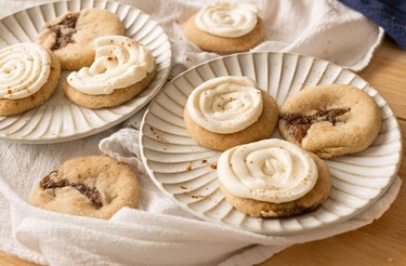 Cinnamon roll cookies on white plates