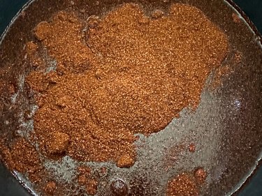 Chili powder in a pan with water for making dye