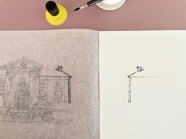 Traced drawing next to transferred ink line print of house