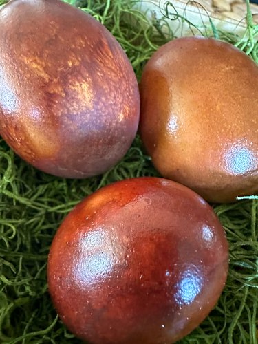 Hard-boiled eggs dyed with red onion skins