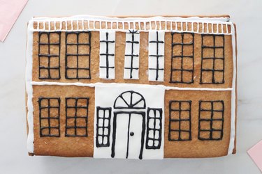 Gingerbread cookie mansion with fondant and icing windows