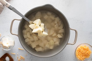 Potatoes in a pot of water