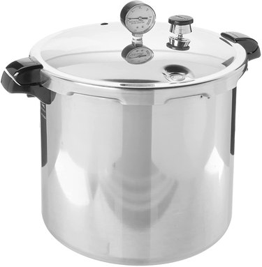 Presto pressure canner on a white ground.