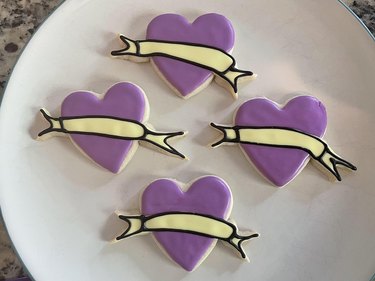 Purple heart-shaped cookies air-drying