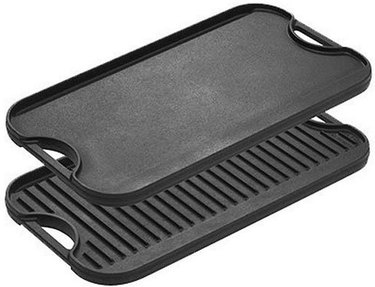 A Lodge 20-Inch by 10.5-Inch Cast-Iron Reversible Grill and Griddle